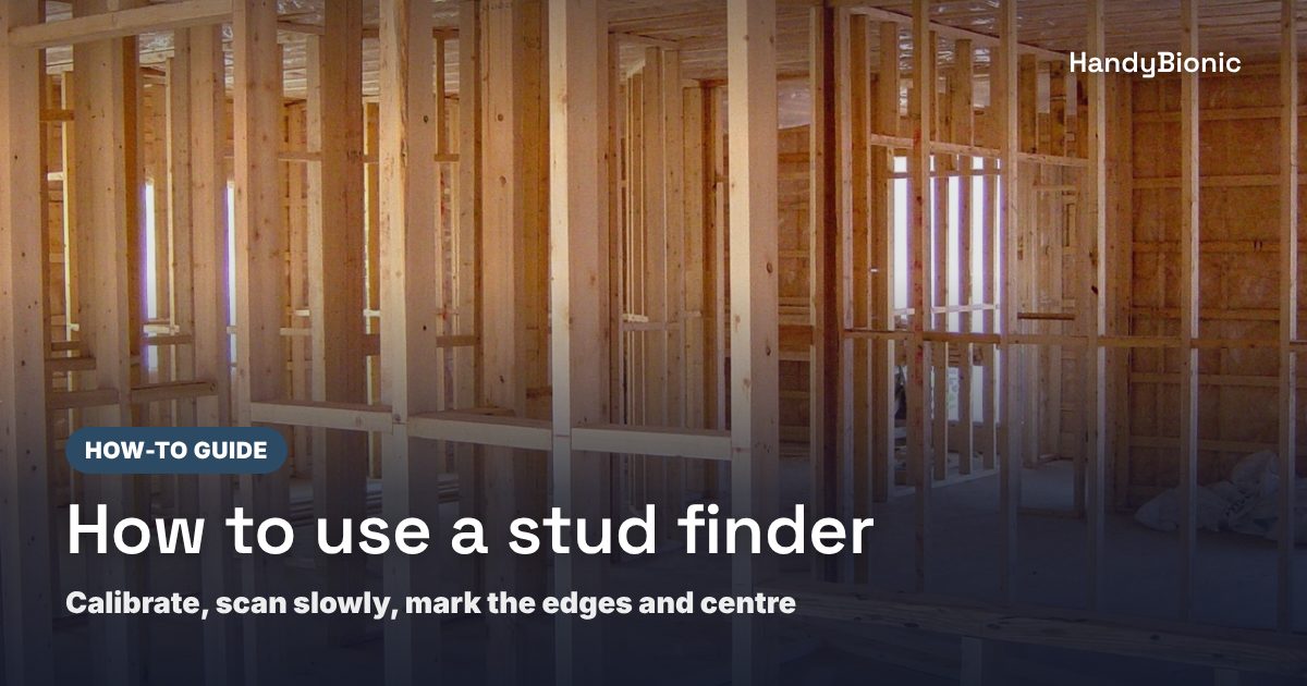 How to use a stud finder: wall studs in an open wood frame, with a how-to guide badge